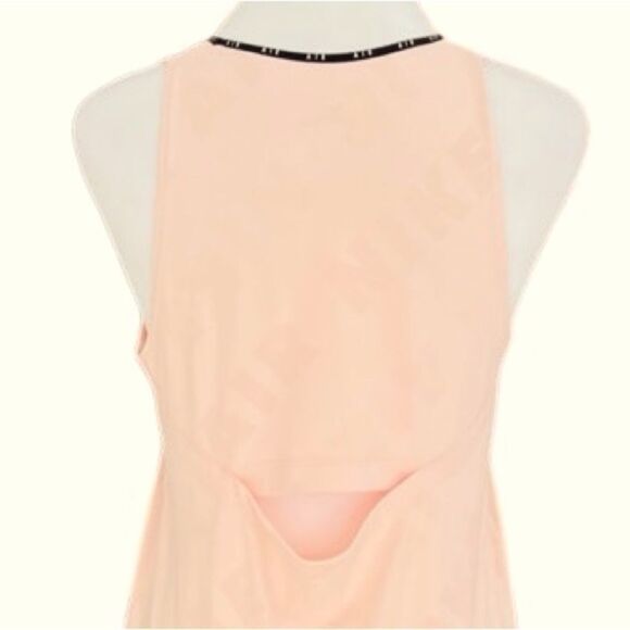 NIKE Women's Dri-Fit Running Tank Top
PINK DD2266-664 SIZE S - Picture 6 of 9